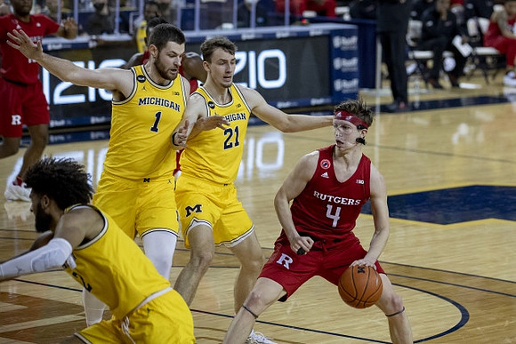 Isaiah Livers (2), Hunter Dickinson (1), and Franz Wagner (21)