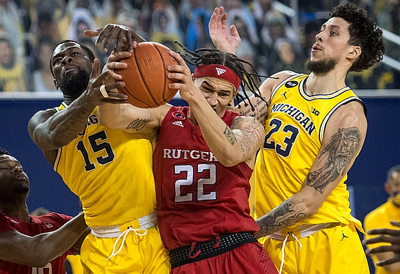 Chaundee Brown Jr. (15) and Brandon Johns Jr. (23)