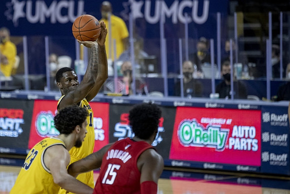 Brandon Johns Jr. (23) and Chaundee Brown Jr. (15)