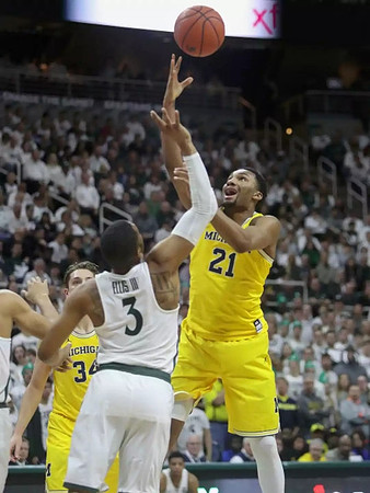 Mark Donnal (34) and Zak Irvin (21)