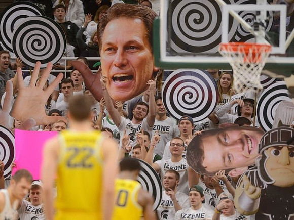 Duncan Robinson (22) and Derrick Walton Jr. (10)