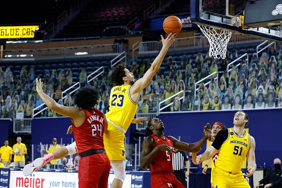 Brandon Johns Jr. (23) and Austin Davis (51)