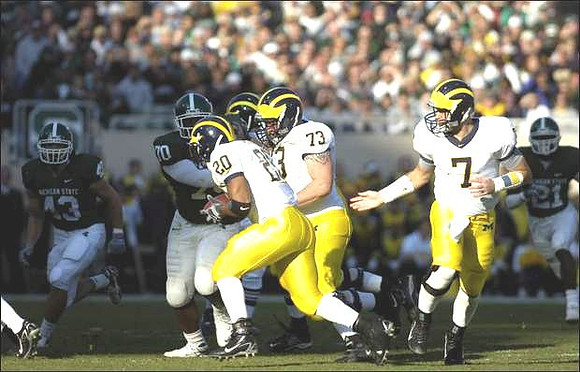 Michael Hart, Chad Henne, and Alex Mitchell