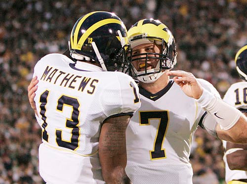 Greg Mathews, Chad Henne, and Adrian Arrington