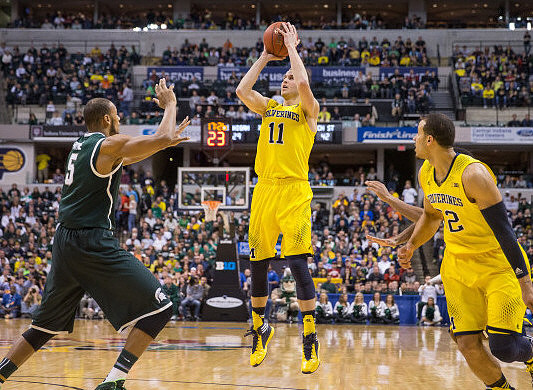Nik Stauskas (11) and Jordan Morgan (52)