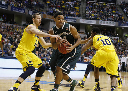 Nik Stauskas (11) and Derrick Walton Jr. (10)