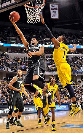 Caris LeVert (23), Derrick Walton Jr. (10), and Glenn Robinson III (1)