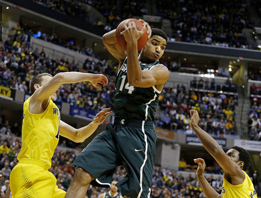 Nik Stauskas (11) and Derrick Walton Jr. (10)
