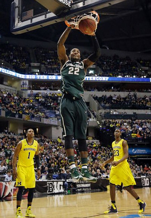 Glenn Robinson III (1) and Caris LeVert (23)