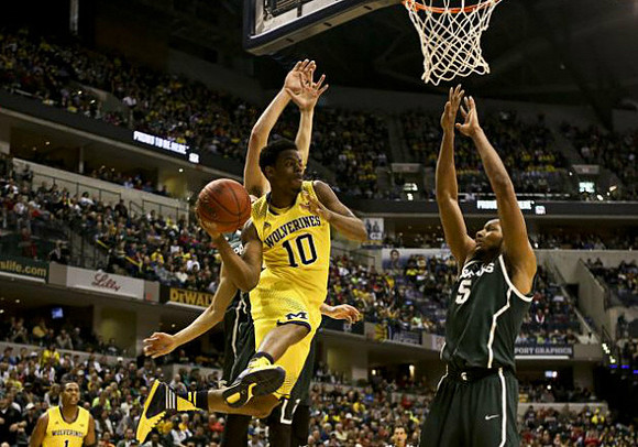 Glenn Robinson III (1) and Derrick Walton Jr. (10)