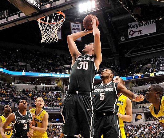 Derrick Walton Jr. (10), Nik Stauskas (11), Max Bielfeldt (44), and Caris LeVert (23)