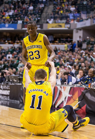 Nik Stauskas (11) and Caris LeVert (23)
