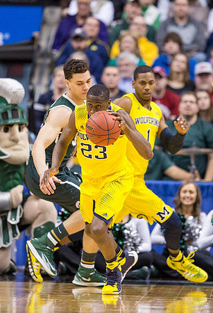 Caris LeVert (23) and Glenn Robinson III (1)