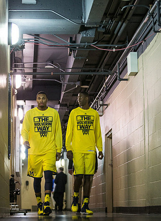 Zak Irvin (21) and Caris LeVert (23)