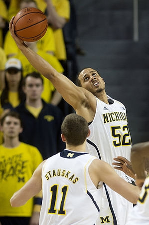 Nik Stauskas (11) and Jordan Morgan (52)