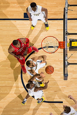 Derrick Walton Jr. (10), Jon Horford (15), Caris LeVert (23), and Nik Stauskas (11)