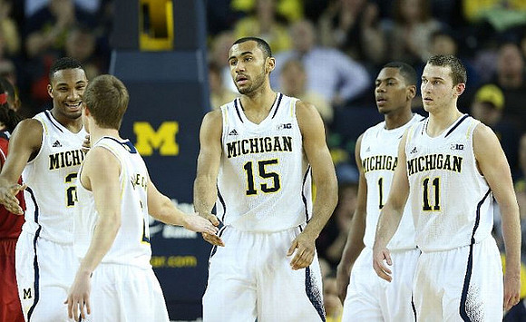 Zak Irvin (21), Spike Albrecht (2), Jon Horford (15), Glenn Robinson III (1), and Nik Stauskas (11)