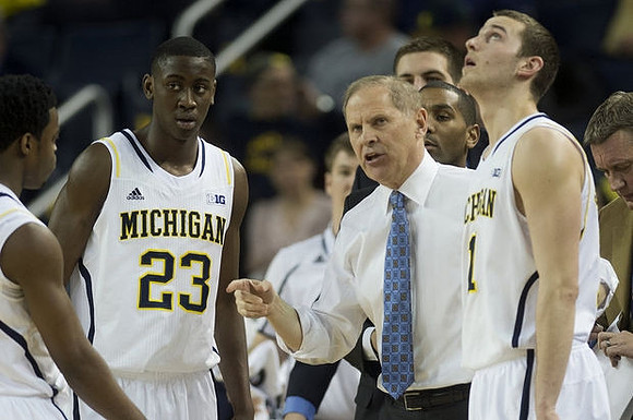 Derrick Walton Jr. (10), Caris LeVert (23), John Beilein, and Nik Stauskas (11)