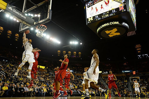 Nik Stauskas (11), Jon Horford (15), Glenn Robinson III (1), and Spike Albrecht (2)