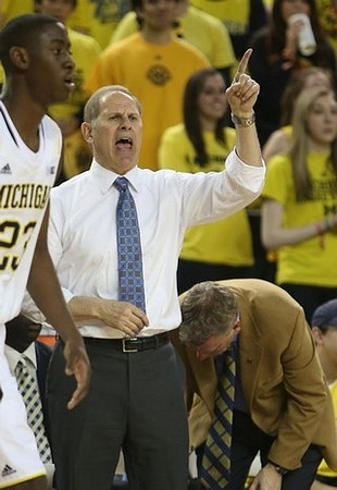 Caris LeVert (23), John Beilein, and Jeff Meyer