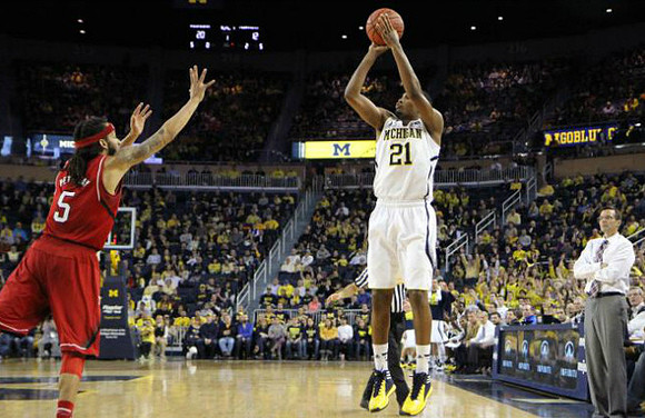 Zak Irvin (21) and Nebraska Head Coach Tim Miles