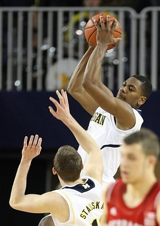 Nik Stauskas (11) and Glenn Robinson III (1)