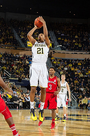 Zak Irvin (21) and Spike Albrecht (2)