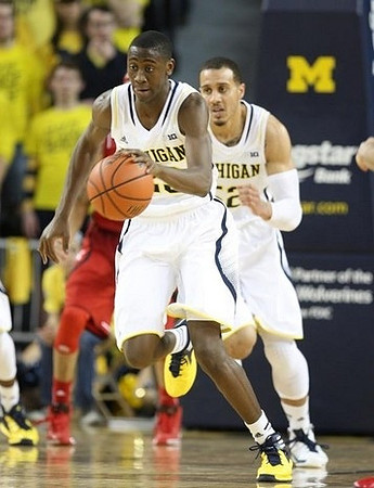 Caris LeVert (23) and Jordan Morgan (52)