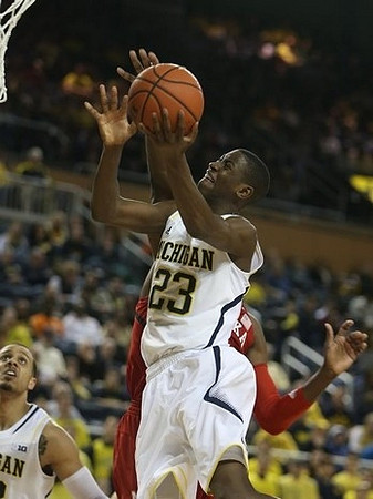 Caris LeVert (23) and Jordan Morgan (52)