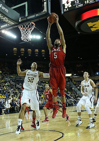 Jordan Morgan (52) and Nik Stauskas (11)