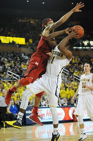 Glenn Robinson III (1) and Nik Stauskas (11)