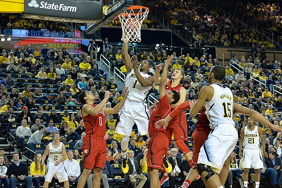 Spike Albrecht (2), Glenn Robinson III (1), Jon Horford (15), and Zak Irvin (21)