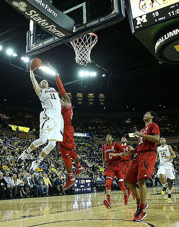 Nik Stauskas (11) and Jon Horford (15)