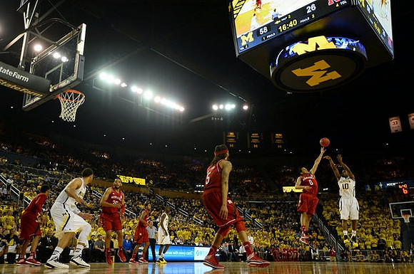 Jordan Morgan (52), Caris LeVert (23), and Derrick Walton Jr. (10)