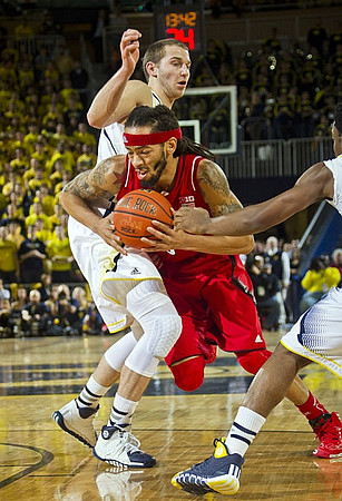 Nik Stauskas (11) and Derrick Walton Jr. (10)