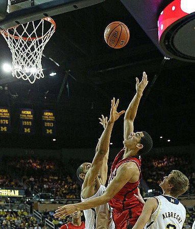 Jon Horford (15) and Spike Albrecht (2)