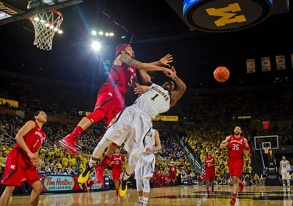 Glenn Robinson III (1), Nik Stauskas (11), and Jordan Morgan (52)