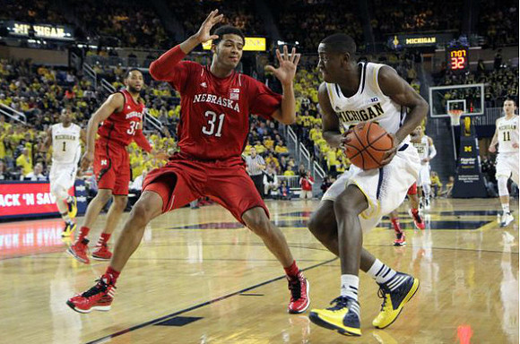 Caris LeVert (23), Glenn Robinson III (1), Jordan Morgan (52), and Nik Stauskas (11)