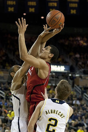 Jon Horford (15) and Spike Albrecht (2)