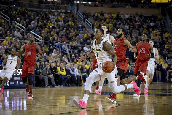 Charles Matthews (1), Zavier Simpson (3), Jon Teske (15), and Ignas Brazdeikis (13)