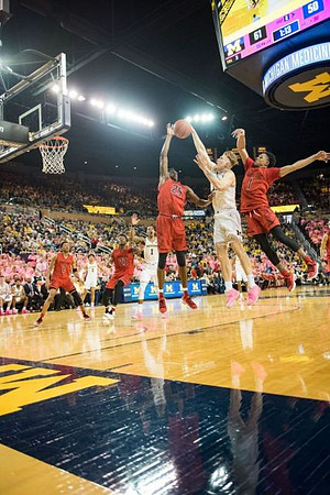 Ignas Brazdeikis (13), Jordan Poole (2), and Charles Matthews (1)