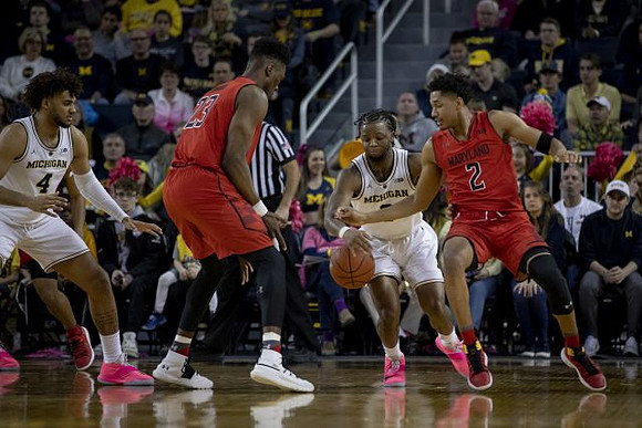 Isaiah Livers (4) and Zavier Simpson (3)
