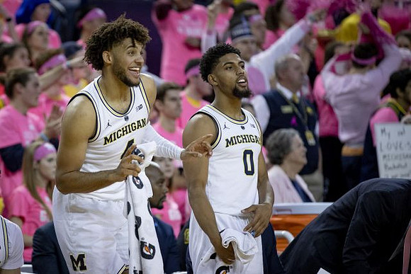 Isaiah Livers (4) and David DeJulius (0)