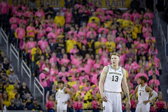Jordan Poole (2), Ignas Brazdeikis (13), and Isaiah Livers (4)