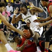 Isaiah Livers (4) and Zavier Simpson (3)