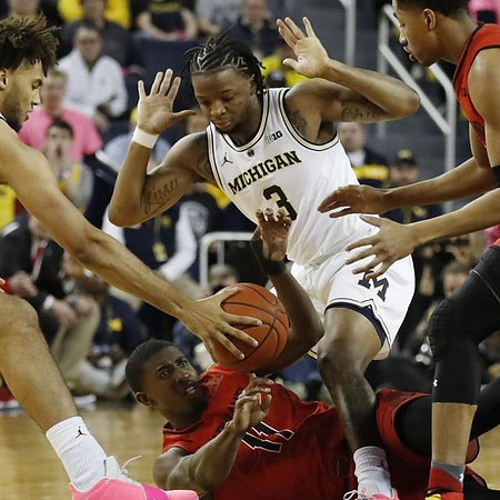 Isaiah Livers (4) and Zavier Simpson (3)