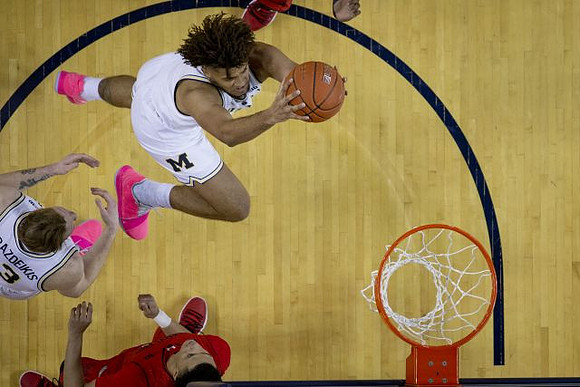 Ignas Brazdeikis (13) and Isaiah Livers (4)
