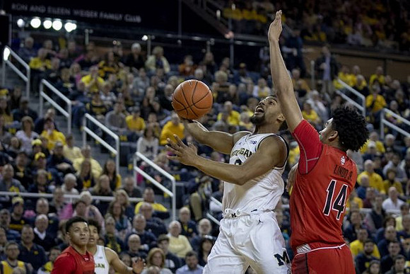 David DeJulius (0) and Jordan Poole (2)