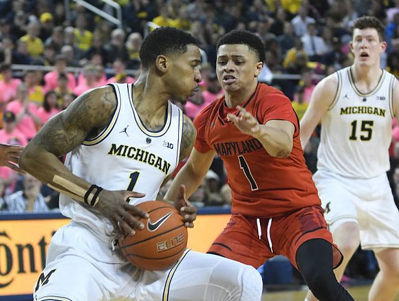 Charles Matthews (1) and Jon Teske (15)