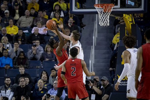 Jon Teske (15) and Isaiah Livers (4)